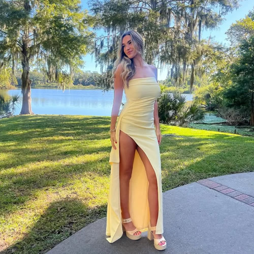 SIM CITY World’s sexiest volleyball star Kayla Simmons risks wardrobe malfunction in daring gown at wedding
